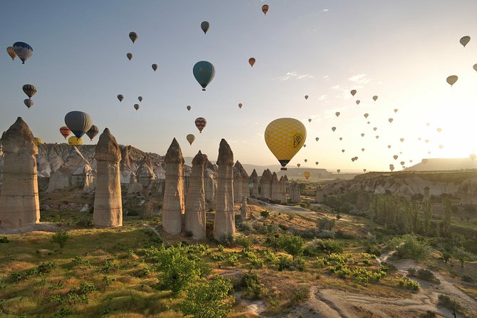 Cappadocia Balloon Ride - Rising above the fairy chimneys at sunrise