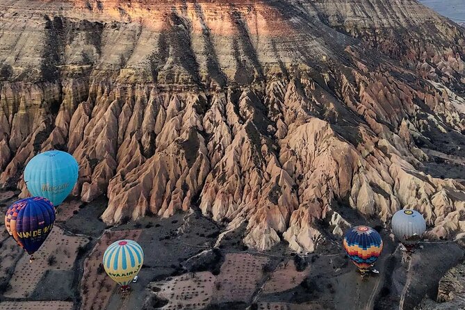 Cappadocia Hot Air Balloon with Pickup, Breakfast & Champagne - A sunrise flight above Cappadocia’s fairy chimneys
