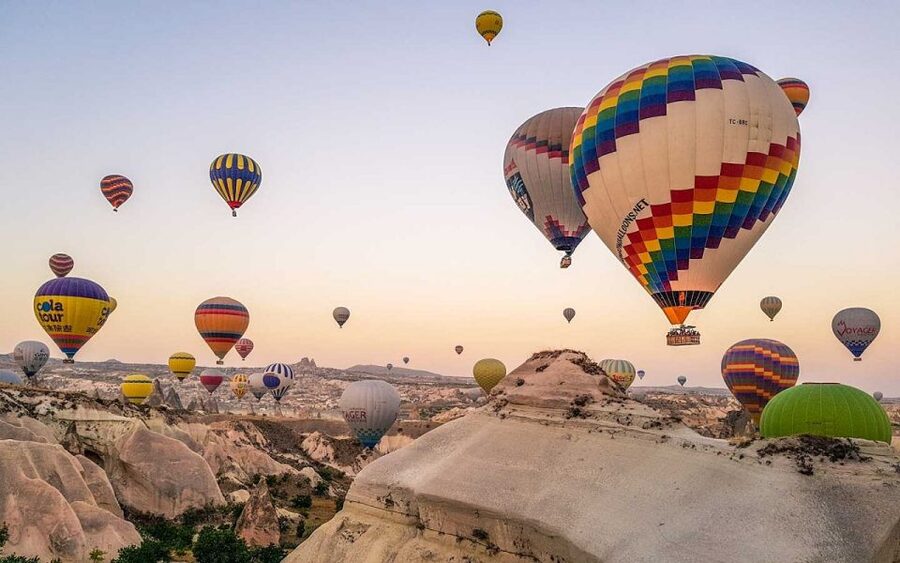 Cappadocia: Red Tour and Sunrise Balloon Tour - Uchisar Castle at the highest point