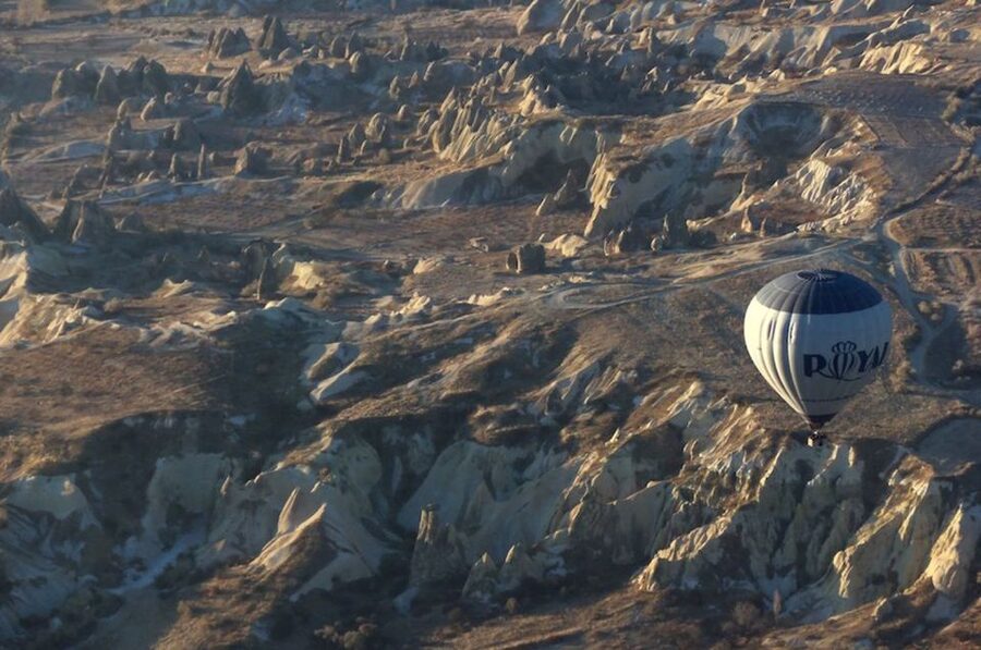 Cappadocia: Royal Queen Hot Air Balloon Tour at Sunrise - The landing, champagne, and commemorative medal