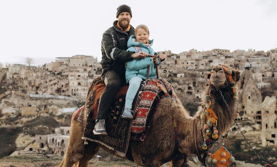 Cappadocia: Sunset or Sunrise Scenic Camel Ride - A camel ride with Uçhisar Castle as the backdrop