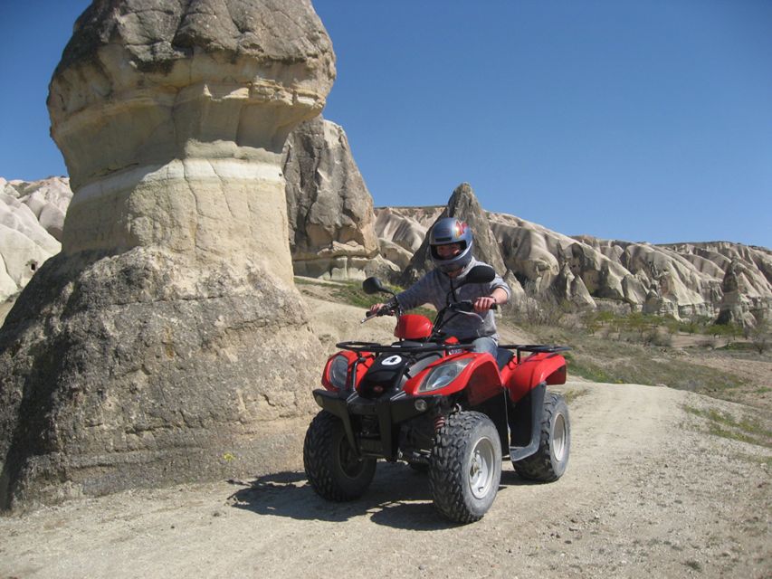 From Göreme: Cappadocia Valleys at Sunset ATV Tour - Leaving Göreme with helmet and driver