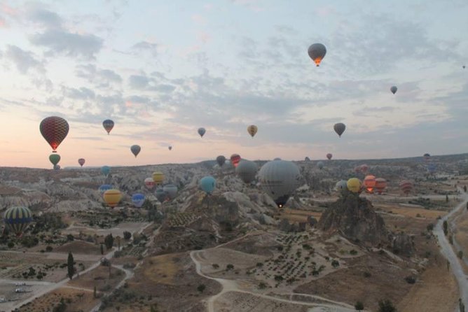 Hot air Balloon Cappadocia Tour ( Goreme Valley ) - Sunrise above Goreme’s fairy chimneys