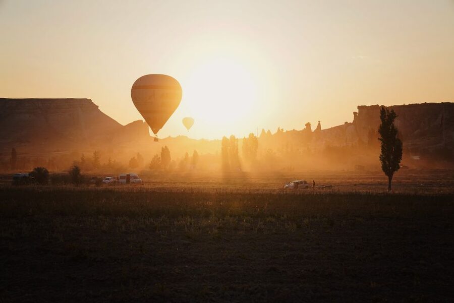 Hot air balloons in Goreme red valley - Why Red Valley Looks Different From a Balloon
